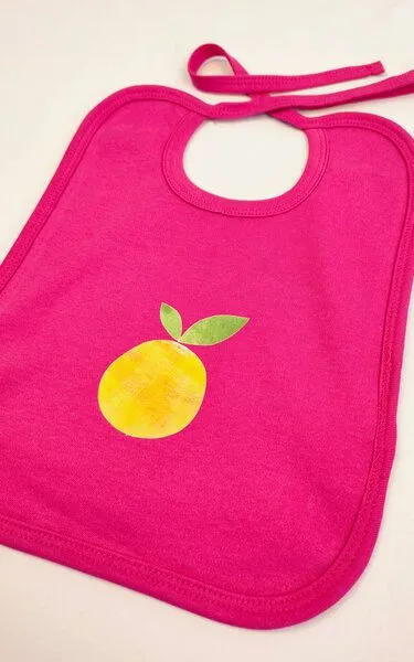 MelaDi MelaDi Kinder Baby-Lätzchen aus Biobaumwolle - Orange auf Hot Pink – Produktbild 2 von 3
