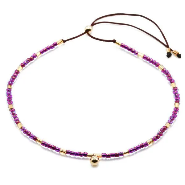 juni juni Lila Perlenarmband "Miss Purple" mit Goldkugel Anhänger aus recyceltem Gold – Produktbild 1 von 4