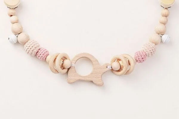 NoniKids Berlin NoniKids Berlin Kinderwagenkette Holz *Schildkröte Glocke* 2 Farben | Bio Baumwolle, Rose, – Produktbild 3 von 4