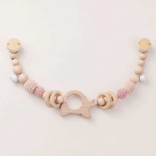 NoniKids Berlin NoniKids Berlin Kinderwagenkette Holz *Schildkröte Glocke* 2 Farben | Bio Baumwolle, Rose, – Produktbild 1 von 4