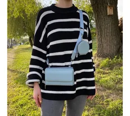 MAONI Geldbörse Geldbörse und Handytasche zum Umhängen - Schwarz (Packung, Handytasche zum Umhängen, einfarbiger Taschengurt, Münztasche), Vegan, Taschengurt auswechselbar, mit Handyfach – Produktbild 1 von 1
