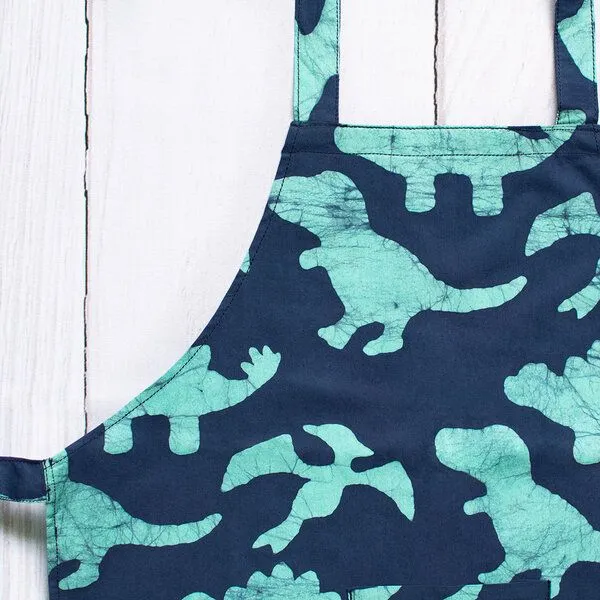 Global Mamas Global Mamas Kinderschürze aus 100% Biobaumwolle, Dinos (blau), – Produktbild 3 von 4