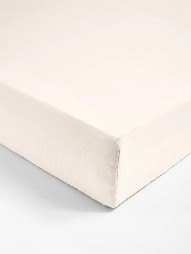 Vertbaudet Vertbaudet Kinder Spannbettlaken aus Baumwollmusselin, Wollweiß, – Produktbild 1 von 3