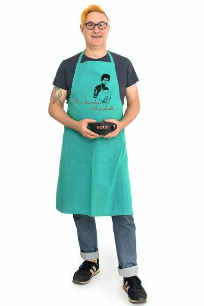 Hirschkind Hirschkind Bio-Kochschürze handgewebt Fair-Trade "Das bisschen Haushalt..." türkis – Produktbild 2 von 3