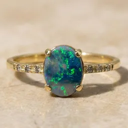 Spirit of Island Spirit of Island Gold Ring | Schwarzer Opal Wellenreiter – Produktbild 1 von 1