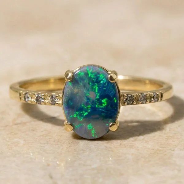 Spirit of Island Spirit of Island Gold Ring | Schwarzer Opal Wellenreiter, Blau, – Produktbild 1 von 4