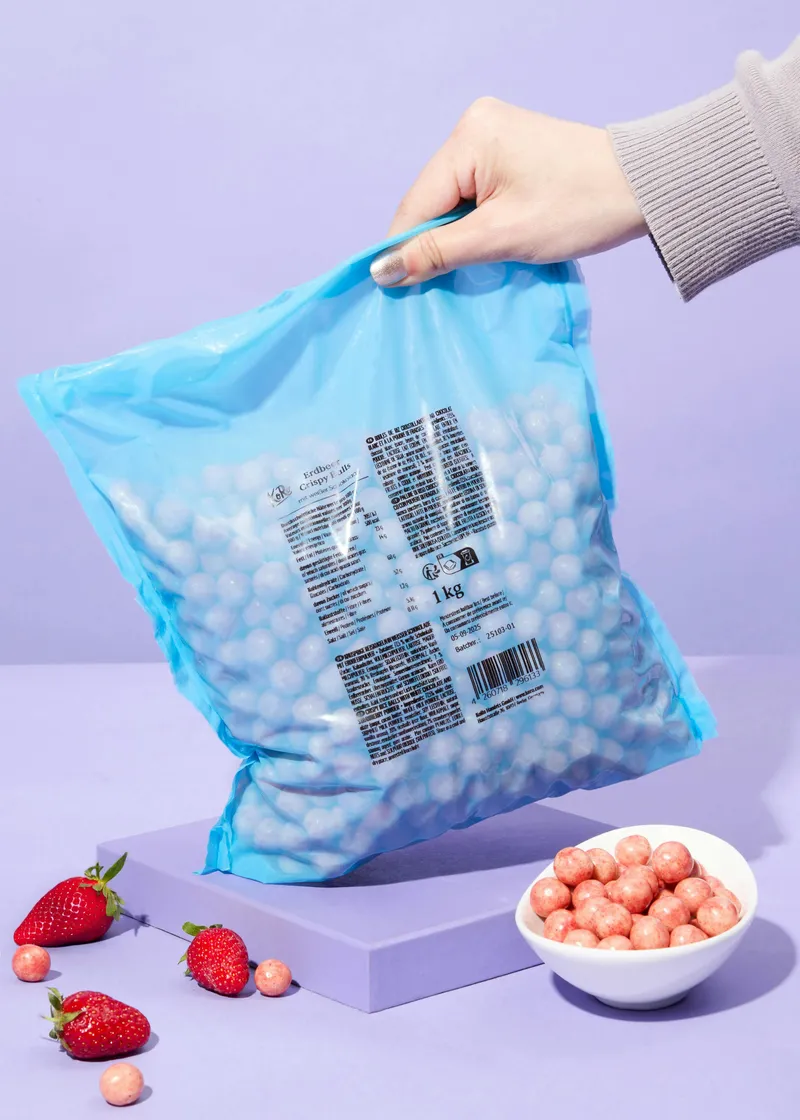 KoRo Reis Crispies in weißer Schokolade und Erdbeerpulver 1 kg – Produktbild 3 von 5