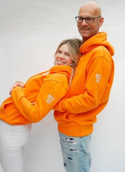 SPARKLES OF LIGHT SPARKLES OF LIGHT Basic Unisex Hoodie | SHINE LOVE LIVE, Orange, – Produktbild 1 von 4
