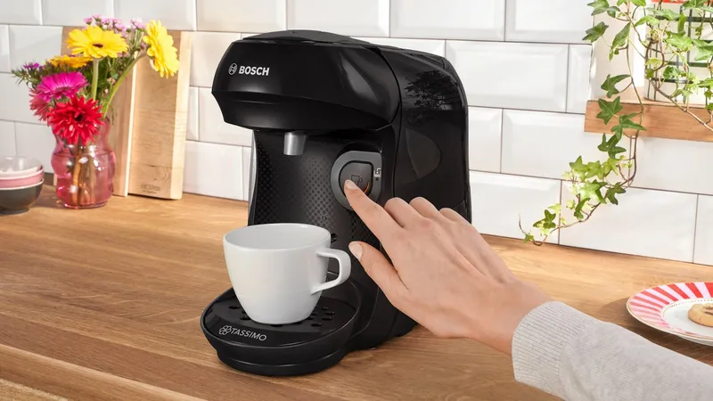 Tassimo Tassimo Kapselmaschine happy friendly TAS102E, über 70 Getränke, platzsparend, geeignet für alle Tassen, Wassertank 0,7 L, Beige|schwarz, – Produktbild 1 von 5