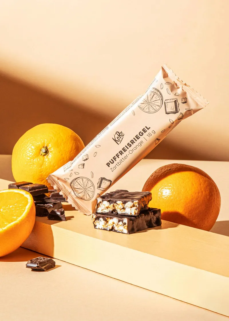 KoRo Puffreisriegel in Zartbitterschokolade mit Orange 18 g – Produktbild 1 von 5