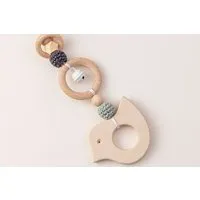 NoniKids Berlin NoniKids Berlin Rasselclip Holz *Glocke Vogel* 3 Farben I Bio Baumwollgarn – Produktbild 1 von 1