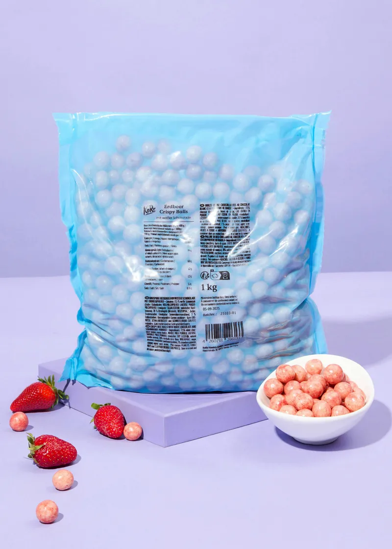 KoRo Reis Crispies in weißer Schokolade und Erdbeerpulver 1 kg – Produktbild 1 von 5