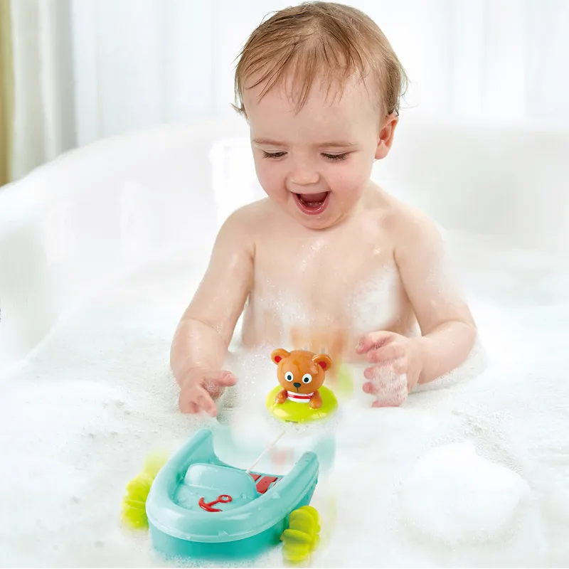 Hape Hape Badespielzeug Schlauchboot mit Rückziehmotor, Mehrfarbig, – Produktbild 2 von 3