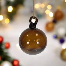 Moogoo Creative Africa Moogoo Creative Africa Mundgeblasene Weihnachtskugel | Brown | handgemacht in Palästina | Fair Trade for Peace – Produktbild 1 von 1