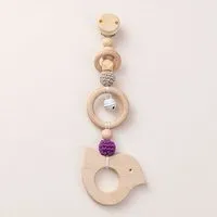 NoniKids Berlin NoniKids Berlin Rasselclip Holz *Glocke Vogel* 3 Farben I Bio Baumwollgarn, Beere, – Produktbild 1 von 1