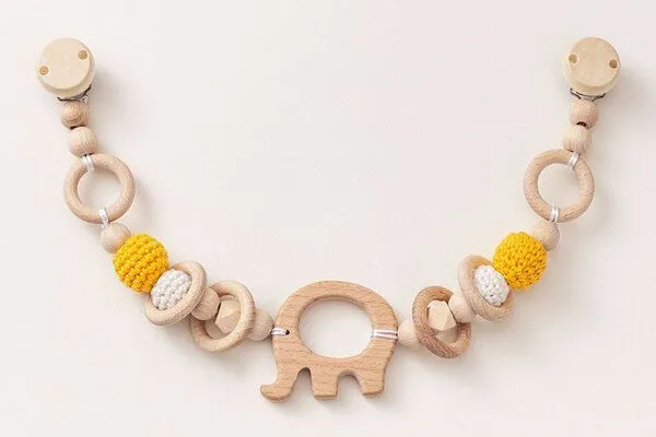 NoniKids Berlin NoniKids Berlin Kinderwagenkette Holz *Elefant* 4 Farben | Bio Baumwolle, Gelb | weiss, – Produktbild 2 von 4
