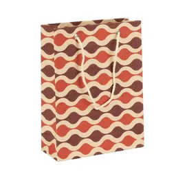 El Puente El Puente "Red Waves" Geschenktüte aus Jute-Papier in Rot | Fair Trade & Handmade aus Bangladesch – Produktbild 1 von 1