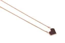 BeWooden BeWooden Kette mit Herzchen Anhänger mit Holzdetail – Produktbild 1 von 1