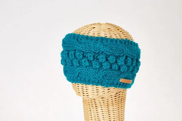 short'n'pietz short'n'pietz Schurwollstirnband mit Zopf- und Kugelmuster, handgestrickt, Türkis, – Produktbild 1 von 1