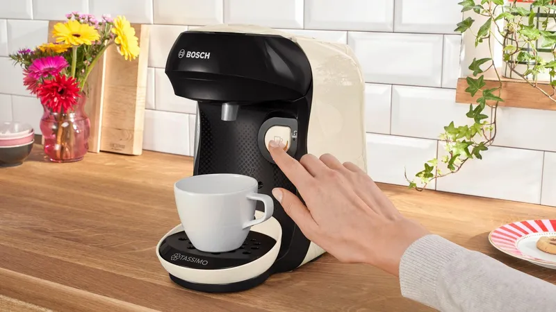 Tassimo Tassimo Kapselmaschine happy friendly TAS107E, über 70 Getränke, platzsparend, geeignet für alle Tassen, Wassertank 0,7 L, Beige, – Produktbild 1 von 5