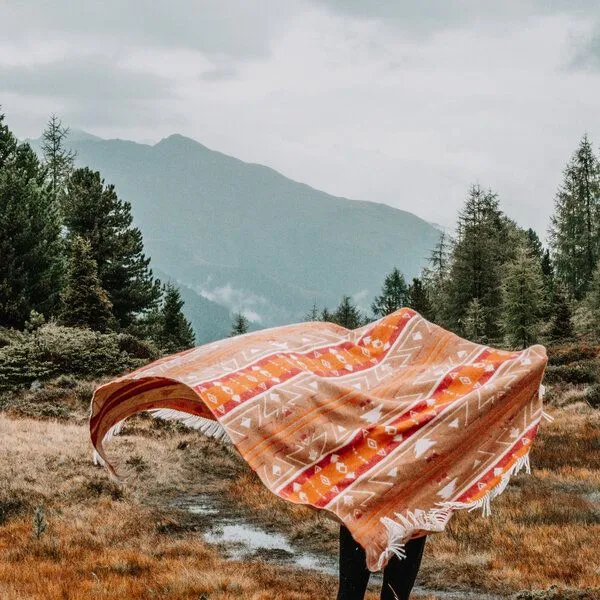 Steppenwolle Steppenwolle Kuscheldecke CANYON aus 100% Schurwolle mit Tribal Muster & Fransen – Produktbild 1 von 4