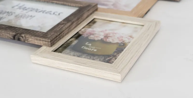 queence Bilderrahmen Collage Rahmen 3D Holz in braun, für 8 Bilder (1 St), Platz für 6 Fotos in 10x15cm und 2 Fotos in 13x18cm, Braun, – Produktbild 4 von 5
