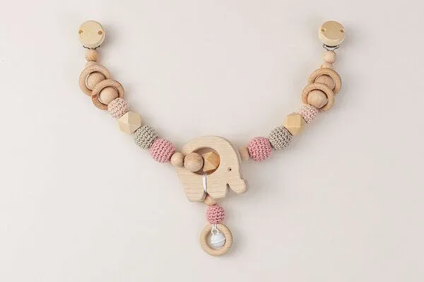 NoniKids Berlin NoniKids Berlin Kinderwagenkette Holz *Elefant Glocke* 2 Farben | Bio Baumwolle, Rosa, – Produktbild 2 von 4