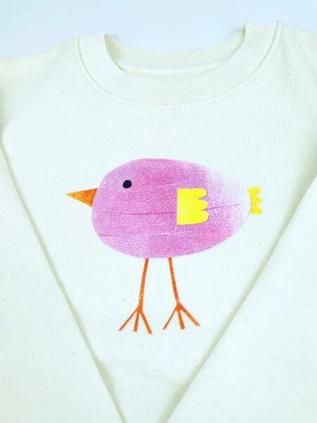 MelaDi Meladi Kinder Sweater aus Biobaumwolle - Lila Vogel auf Natural Raw, Natural white, – Produktbild 3 von 7