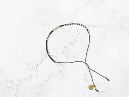 renna deluxe renna deluxe Sternenhimmel – zartes Armband mit Perlen in schwarz-weiß, gold, silber – Produktbild 1 von 1