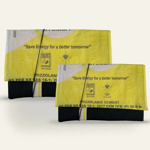 Nyuzi Blackwhite Nyuzi Blackwhite Upcycling Laptophülle 13/15 Zoll aus altem Zementsack, Gelb mombasa cement, – Produktbild 1 von 4