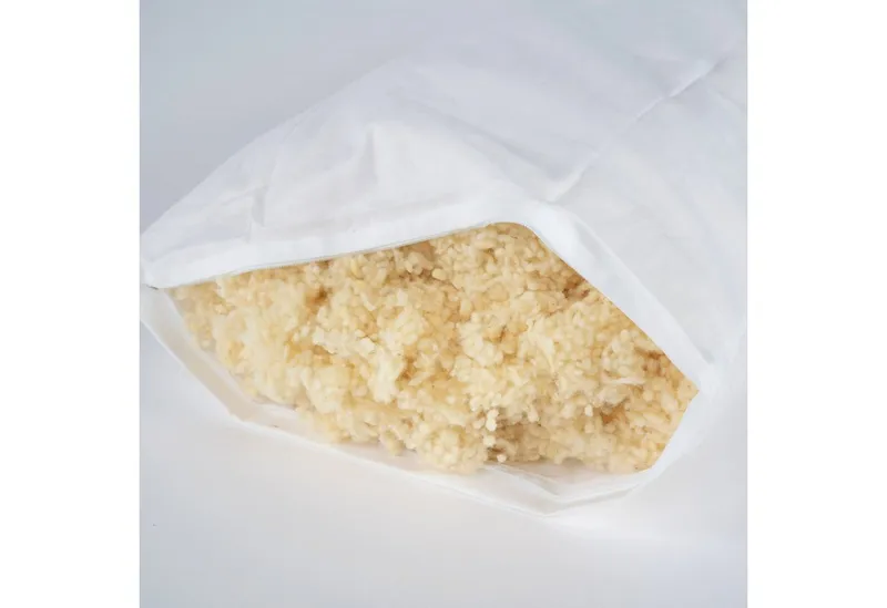 Ritter Decken Kissenfüllung Schurwollkügelchen aus 100% Schurwolle kbT, mulesingfrei, 1 kg, Füllmaterial für Kissen, Nackenrollen & Inletts, natürlich, Beige, – Produktbild 4 von 5