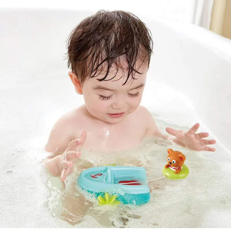 Hape Hape Badespielzeug Schlauchboot mit Rückziehmotor, Mehrfarbig, – Produktbild 3 von 3