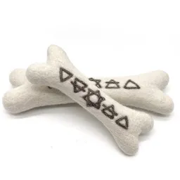 Wooliie Wooliie Alchemy Elements Bone – handgefertigtes Spielzeug aus 100 % naturbelassener Schurwolle – Produktbild 1 von 1