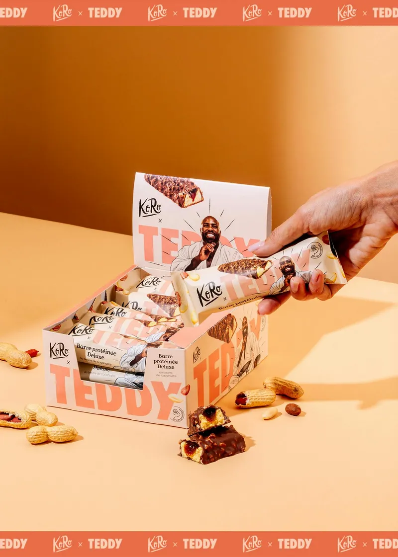 KoRo Limited Edition: Teddy Veganer Proteinriegel Schokolade Brownie 15 x 55 g – Produktbild 4 von 5