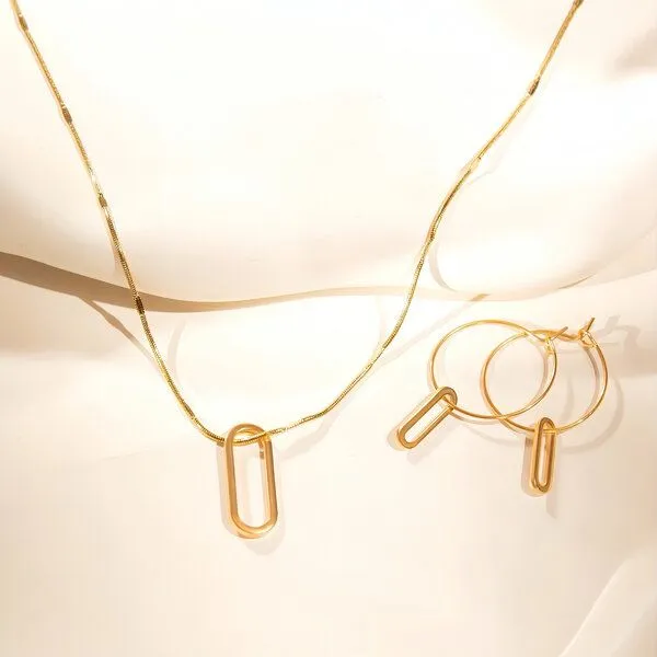 ELEKTROPULLI ELEKTROPULLI Kette 1mm schmal mit grafischem Oval Anhänger, Set mit Ohrringen, Gold, – Produktbild 2 von 4