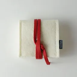 matilda k. manufaktur matilda k. manufaktur Schmuckaufbewahrung 'schmucknest' klein aus Wollfilz wollweiß 'margarete' – Produktbild 1 von 1