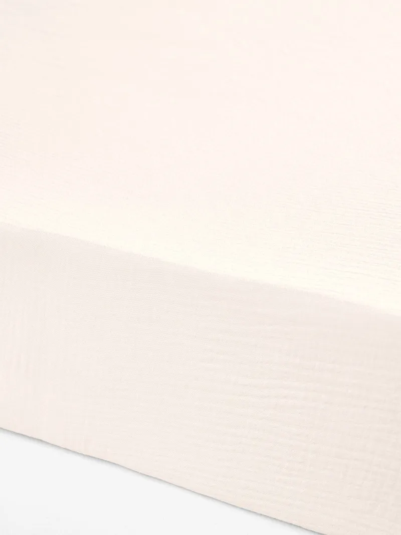 Vertbaudet Vertbaudet Kinder Spannbettlaken aus Baumwollmusselin, Wollweiß, – Produktbild 3 von 3