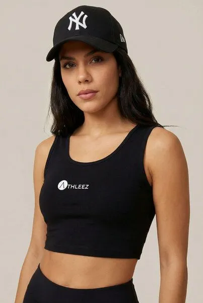 THE FACE OF ELEMENTS THE FACE OF ELEMENTS ATHLEEZ LYO.Pulse - HIGH PERFORMANCE FITTED CROP TOP AUS NATURFASER, Schwarz, – Produktbild 1 von 4