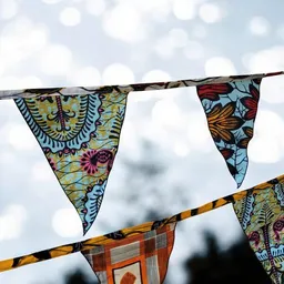 Moogoo Creative Africa Moogoo Creative Africa Wimpelgirlande aus Wax-Stoff | 5 Meter | handgemacht und fair gehandelt – Produktbild 1 von 1