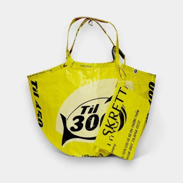 REFISHED fair fashion REFISHED fair fashion Tasche 'SOULMATE' - upcycelte Fischfuttersäcke, #fish gelb-til, – Produktbild 1 von 7